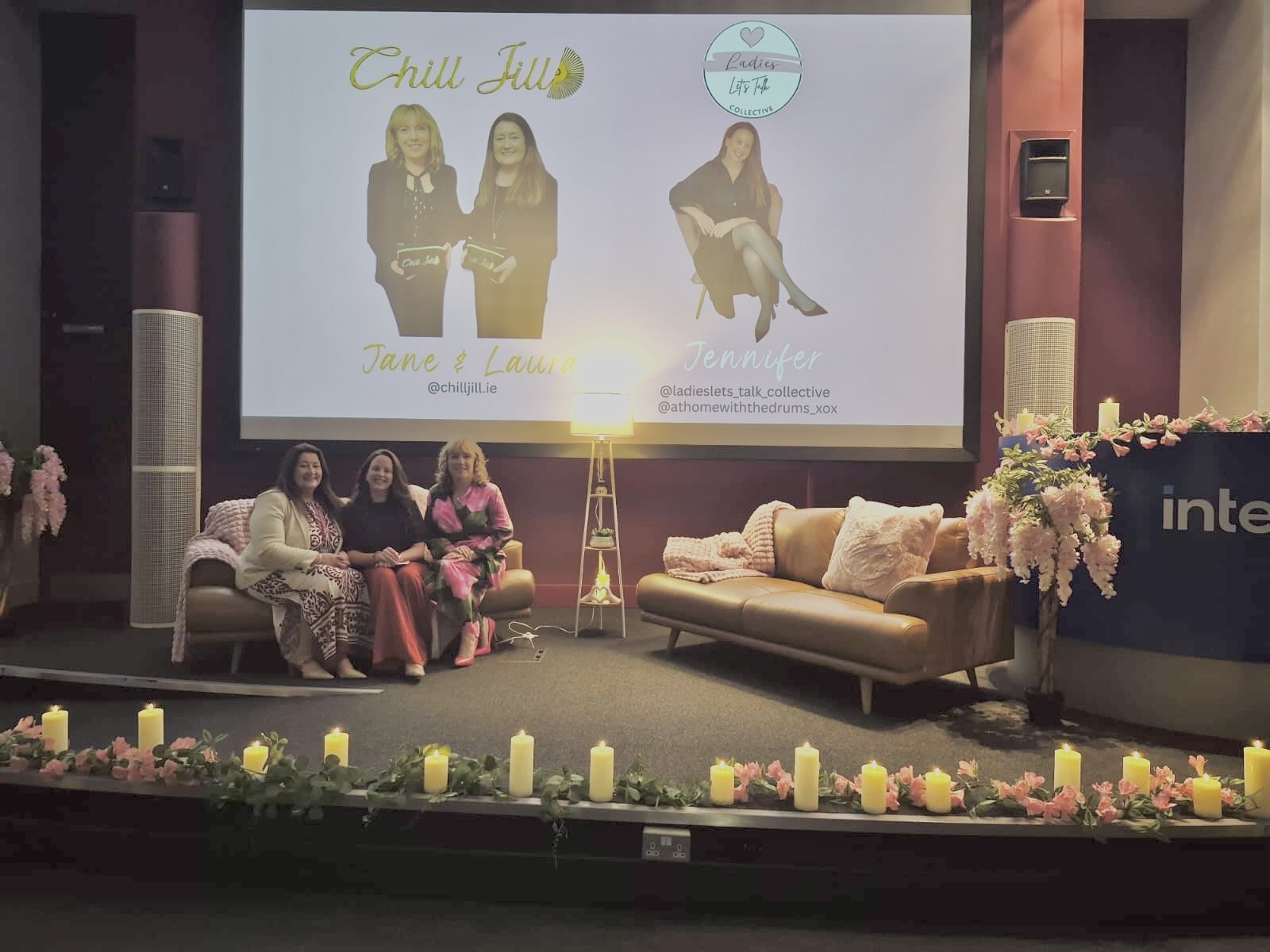 Jen speaking on stage at a Ladies Let's Talk live event